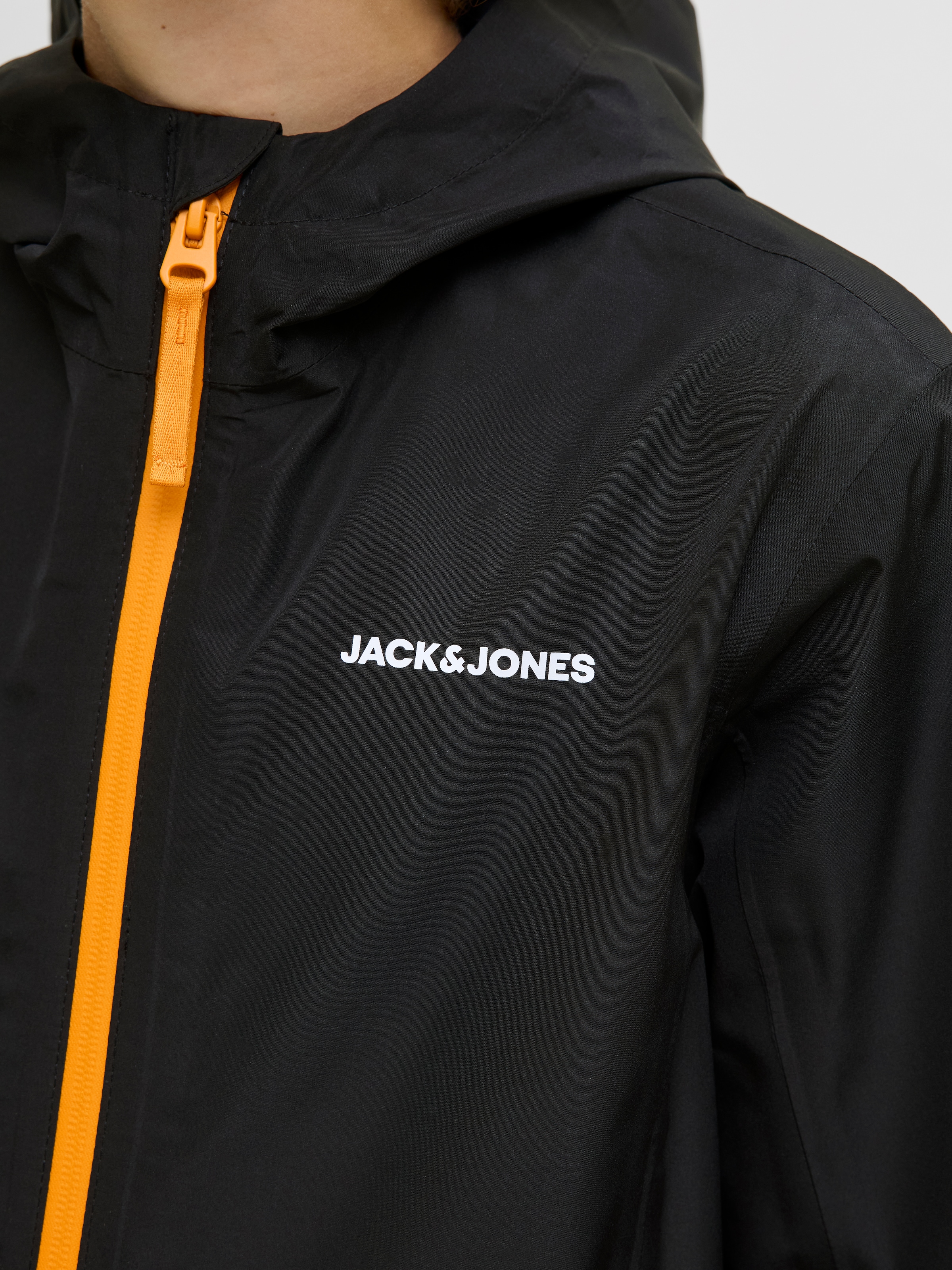 Jack & Jones Junior Regenjacke »JJEFLYNN RAIN JACKET SN JNR«, mit Kapuze