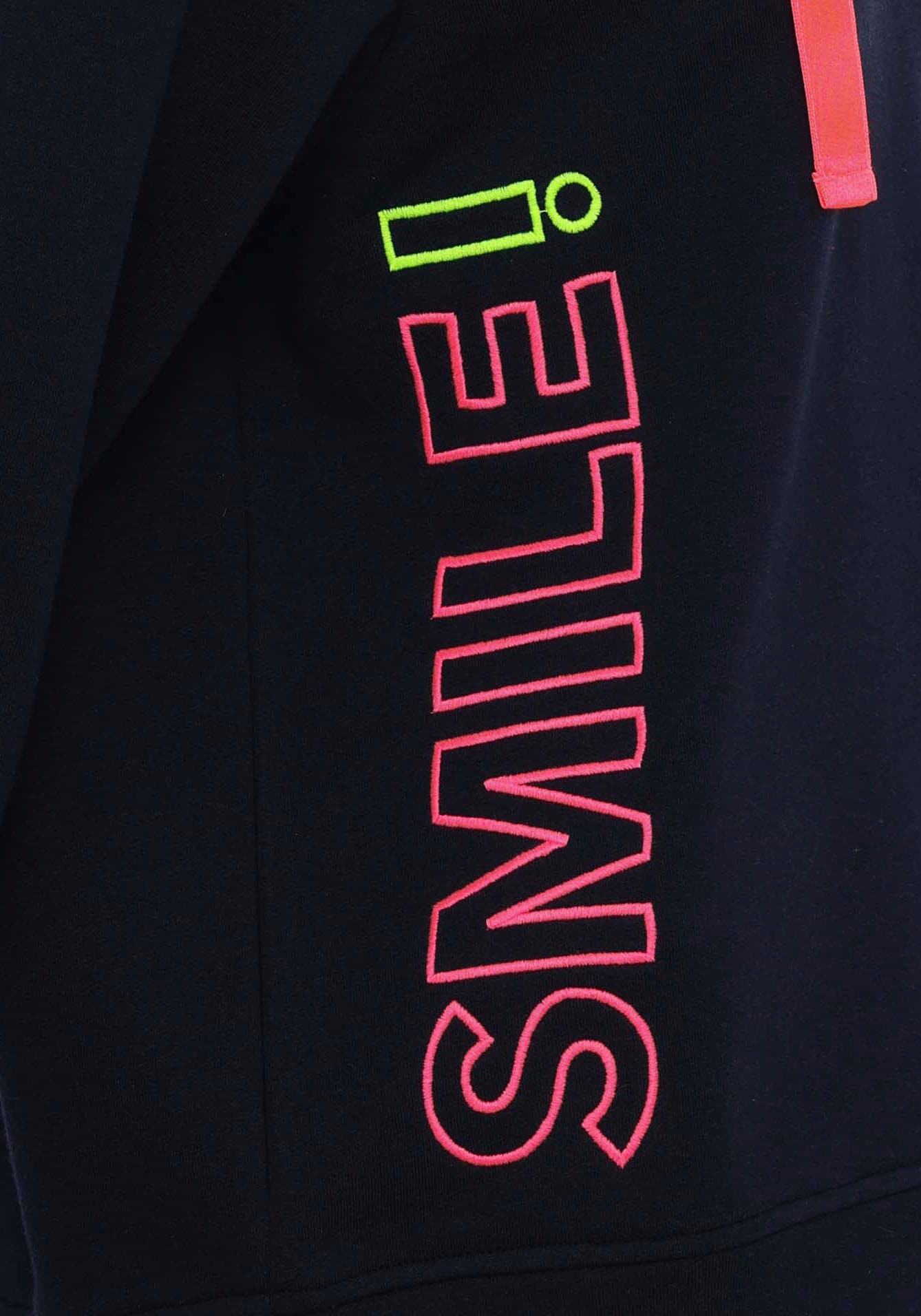 Zwillingsherz Sweatshirt »Smile«, mit V-Ausschnitt, Frontprint durch das Wort Smile, neonfarben