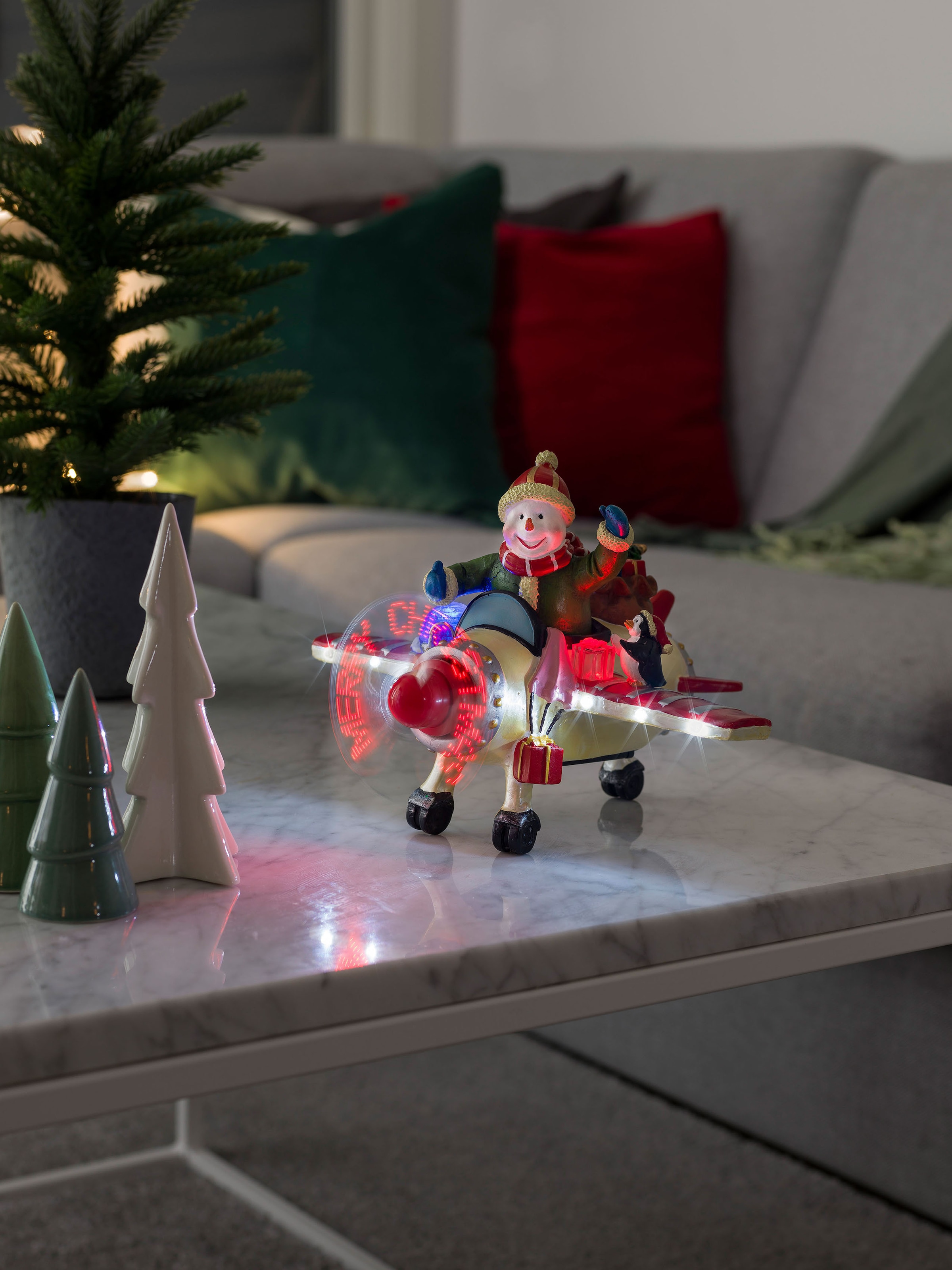 Weihnachtsfigur, LED Szenerie Schneemann im Flugzeug, mit Animation