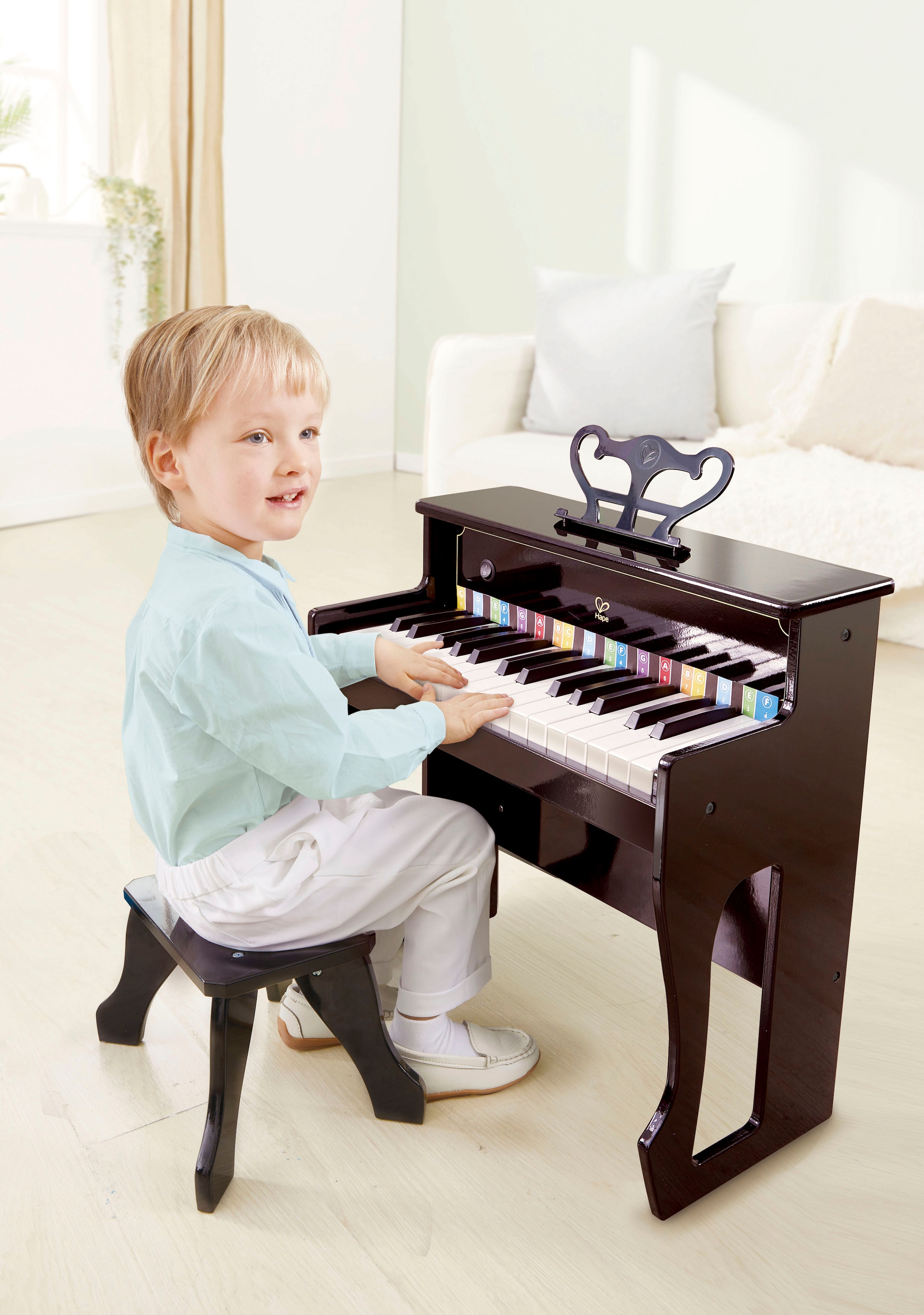 Hape Spielzeug-Musikinstrument »Klangvolles E-Piano«, inklusive Hocker; FSC®- schützt Wald - weltweit