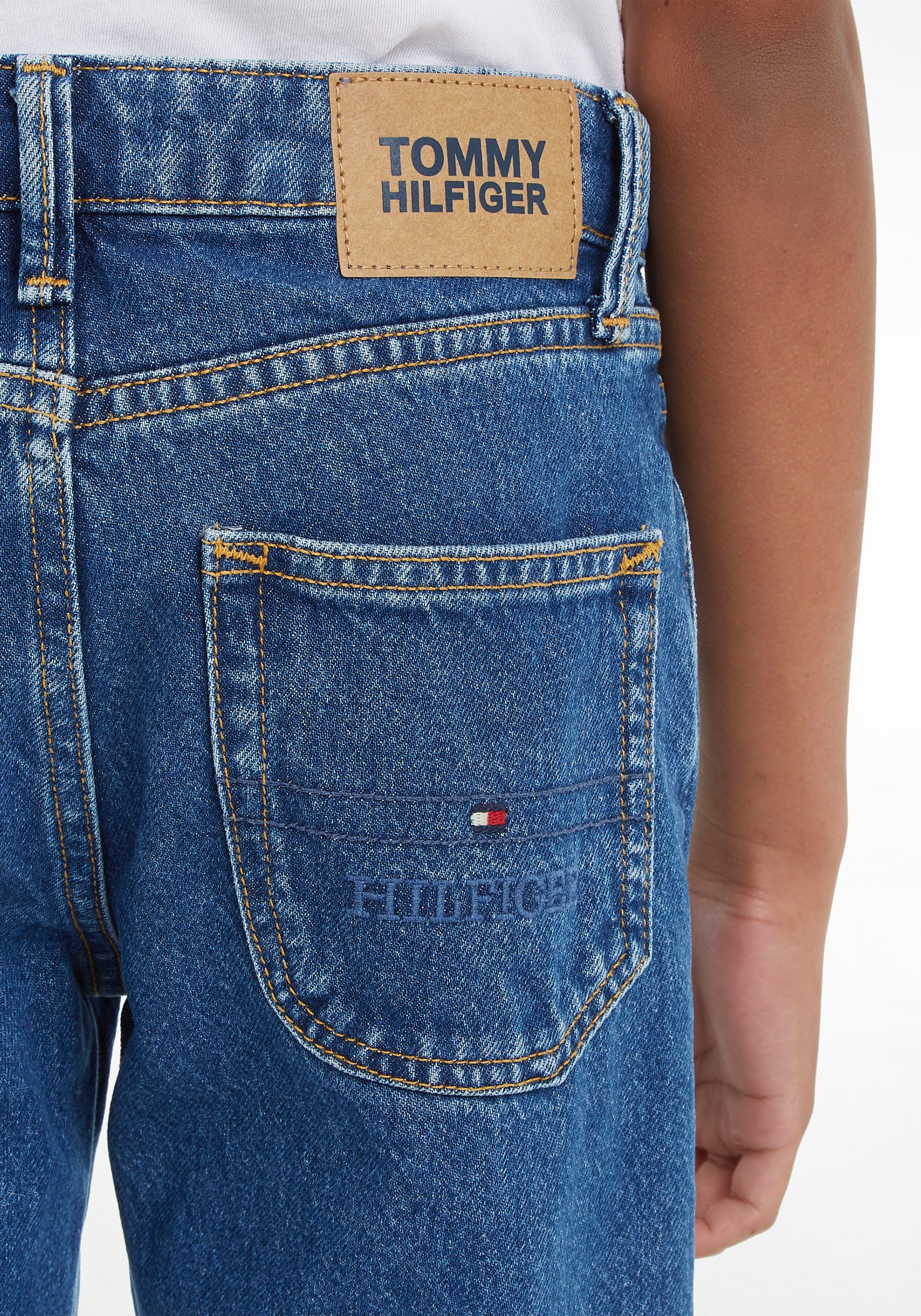 Tommy Hilfiger Stretch-Jeans »SKATER MID BLUE«, mit Leder-Brandlabel am  hinteren Bundabschluss bei ♕