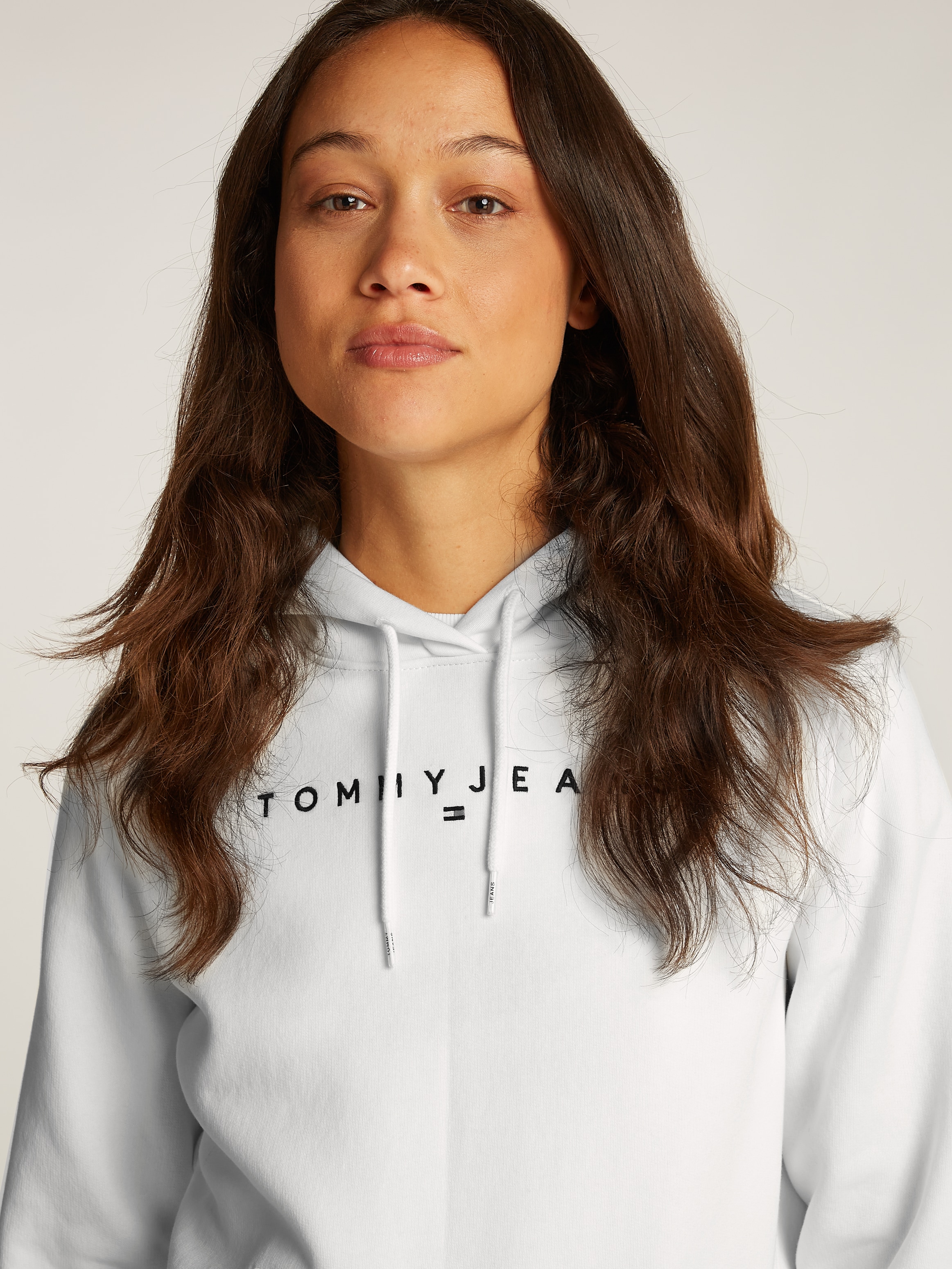 Tommy Jeans Kapuzensweatshirt »TJW REG LINEAR HOODIE«, mit Logoschriftzug