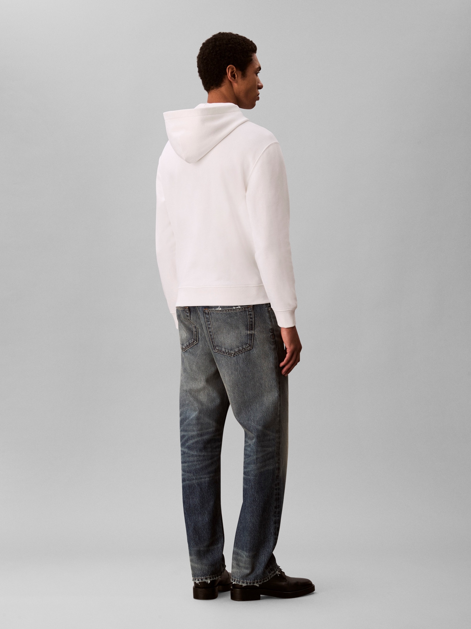 Calvin Klein Kapuzensweatshirt »LS EU STANDARD LOGO 350TERRY PO«, Mit Rundhalsausschnitt, regular fit
