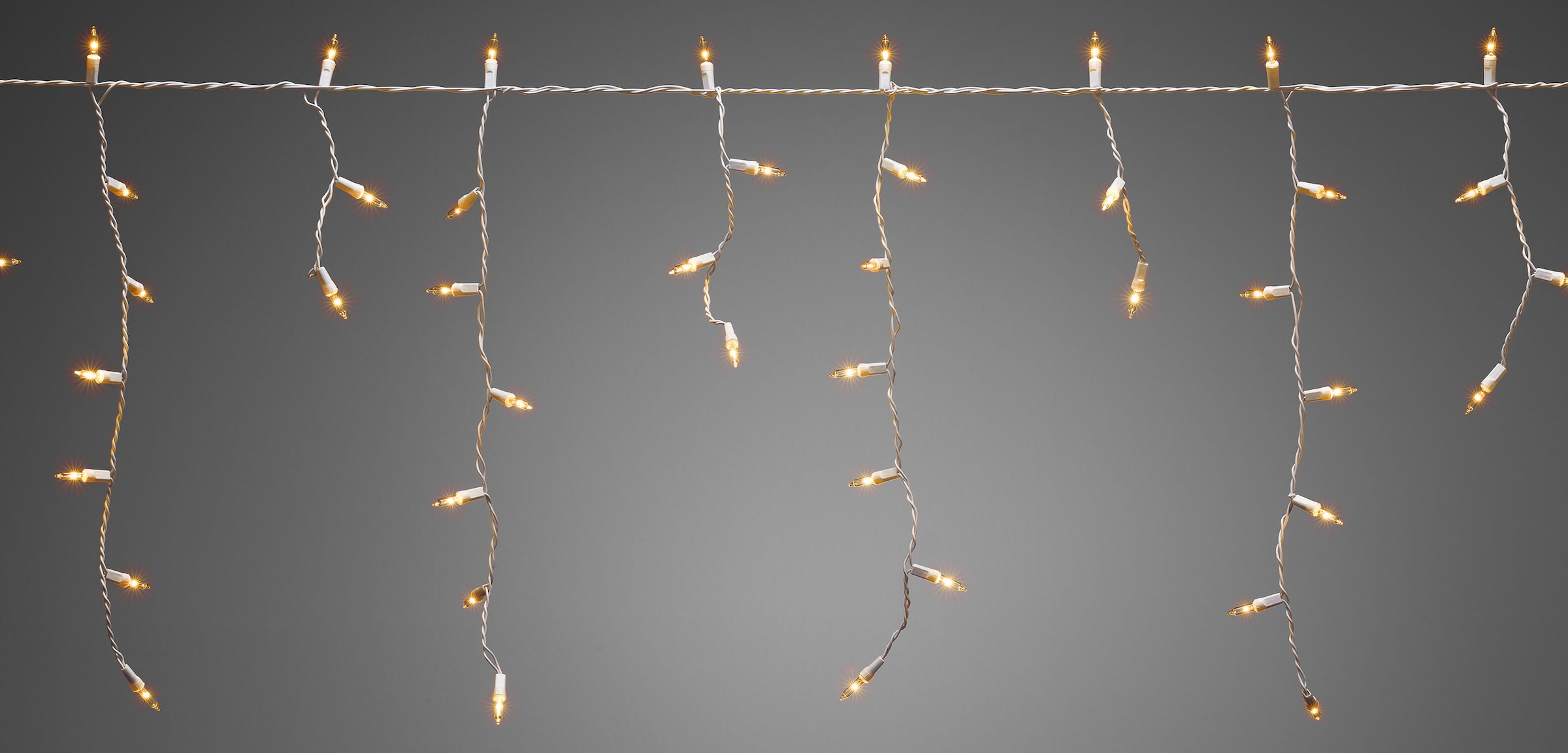 KONSTSMIDE LED-Lichtervorhang »Weihnachtsdeko aussen«, 400 St.-flammig, LED Eisregenvorhang, 400 bernsteinfarbene Dioden, weißes Kabel