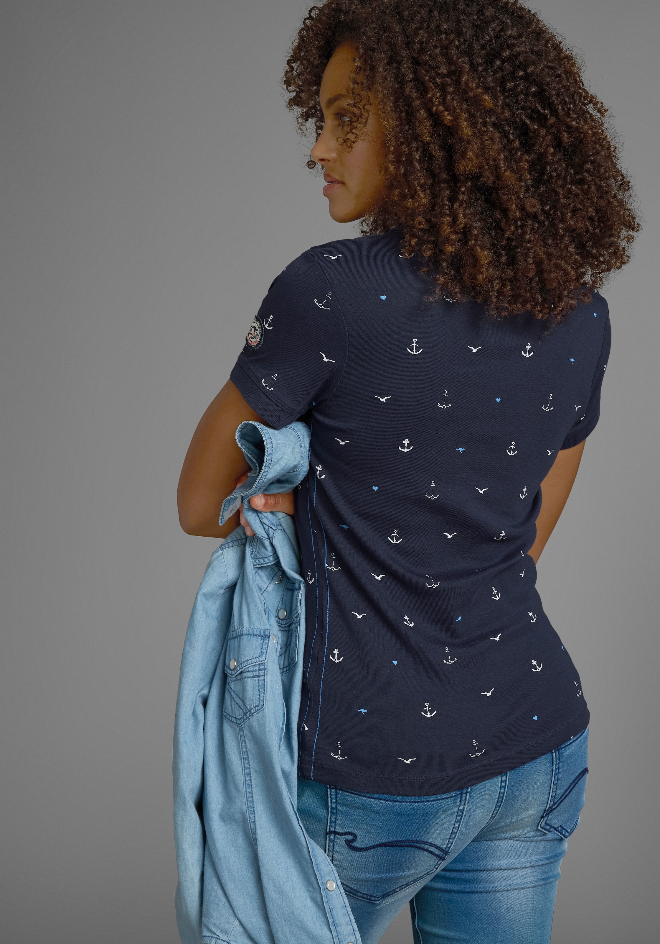 KangaROOS Poloshirt, Kurzarm, sehr figurbetont, mit Allover-Druck, aus 100% Baumwolle