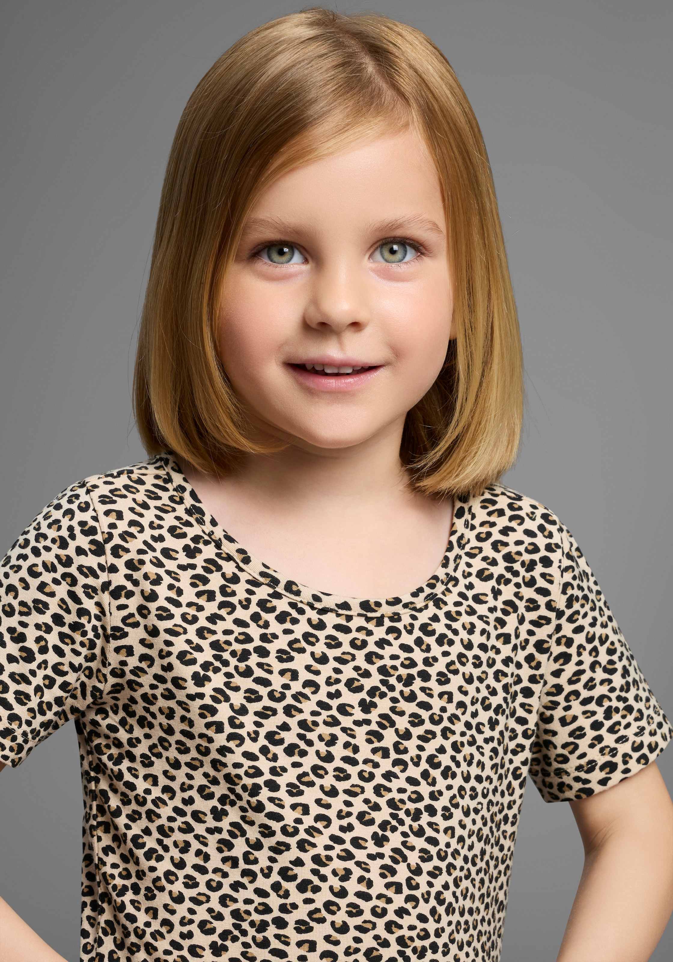 KIDSWORLD Jerseykleid »Shirtkleid in Leo-Musterung« Shirtkleid in Leo-Optik, unten austestellt