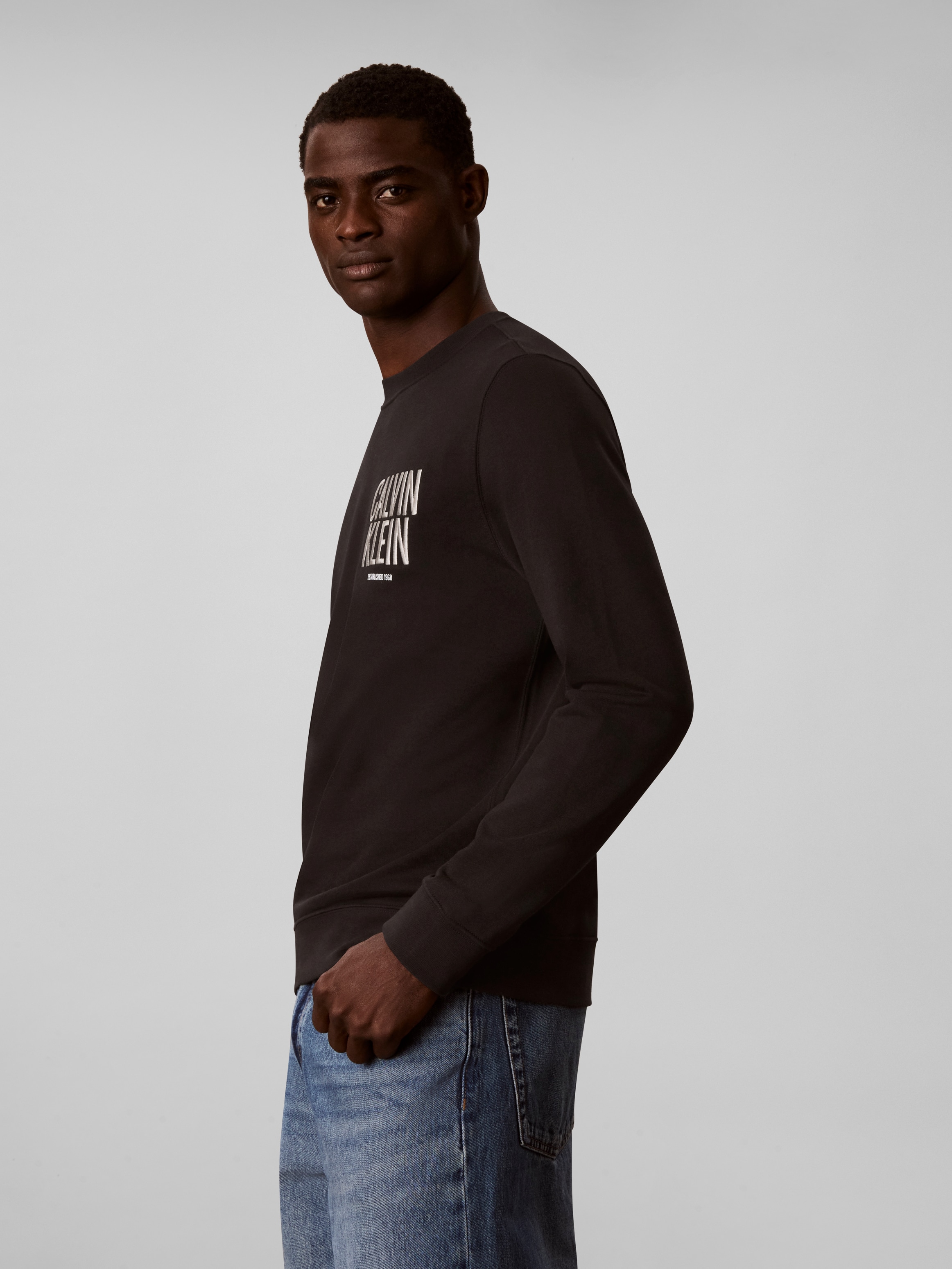 Calvin Klein Jeans Sweatshirt »BOLD CALVIN KLEIN«, Regular fit mit Markenprint
