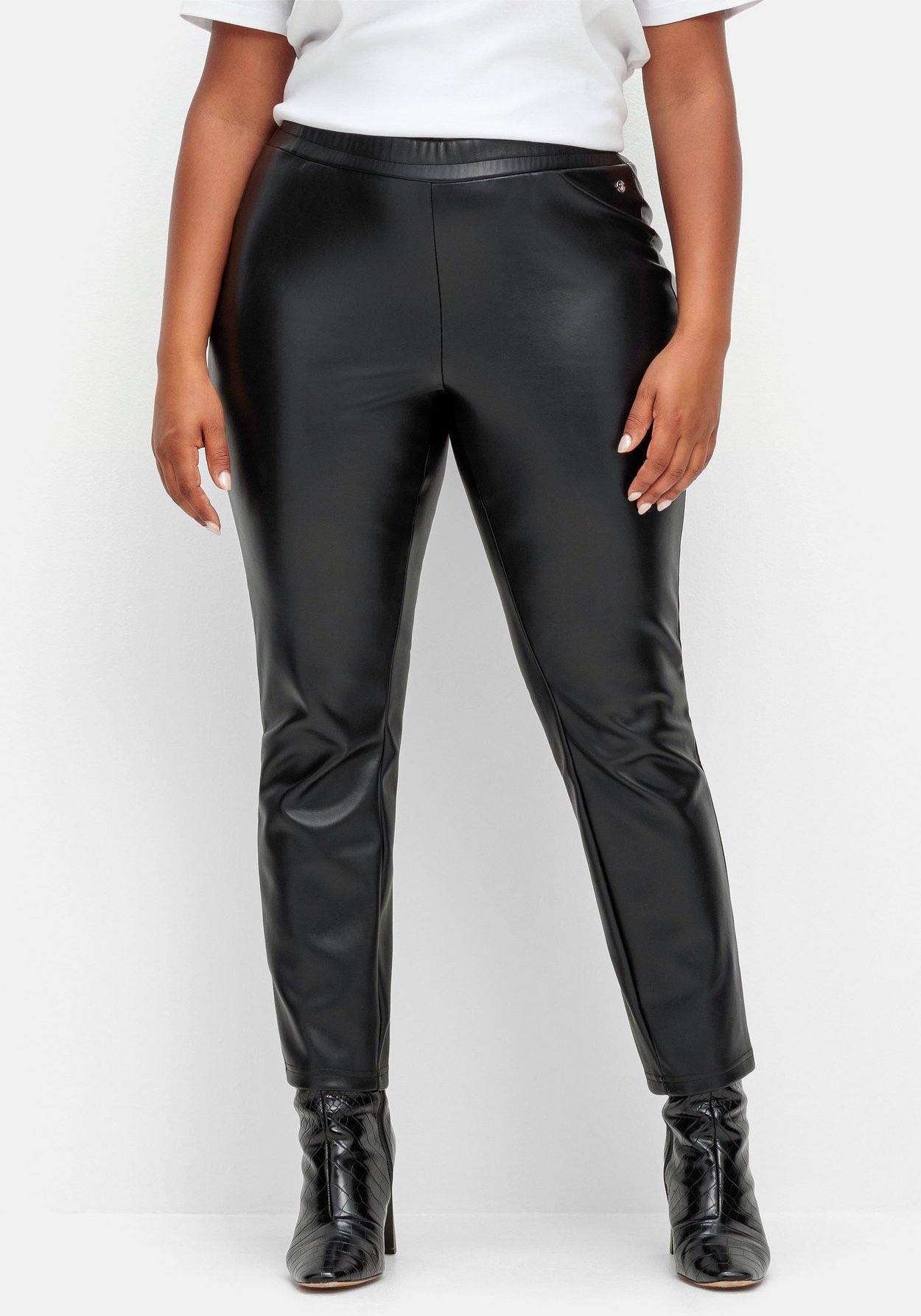 Sheego Leggings »Leggings dezent schimmernd, innen leicht angeraut«