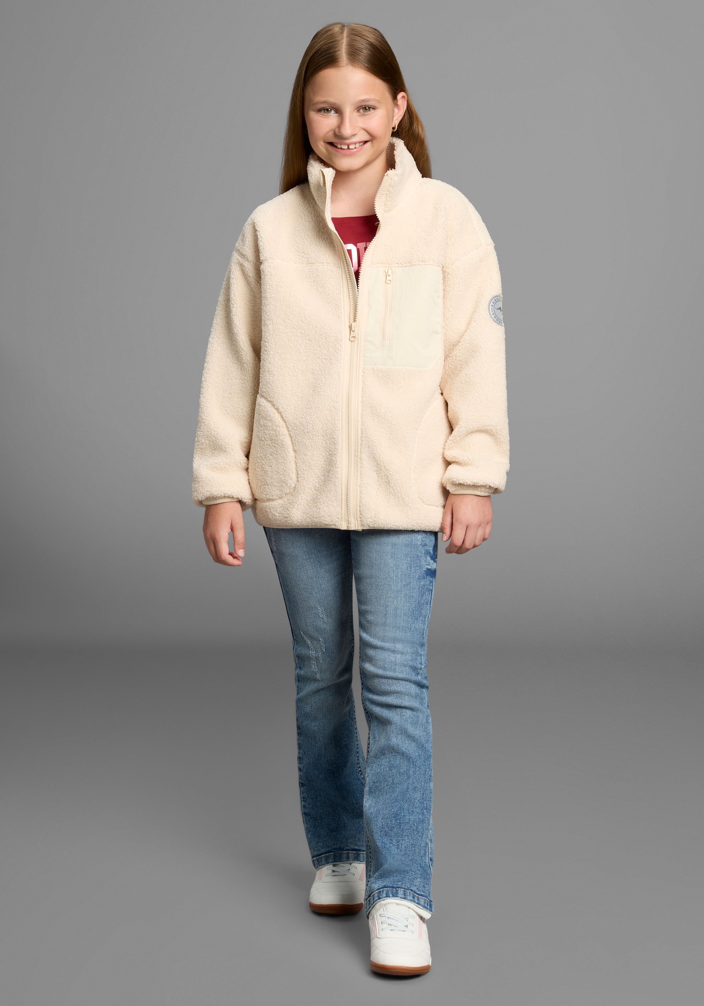 KangaROOS Sweatjacke »Kuschel-Jacke mit reflektierendem Badge« Weicher Teddyplüsch