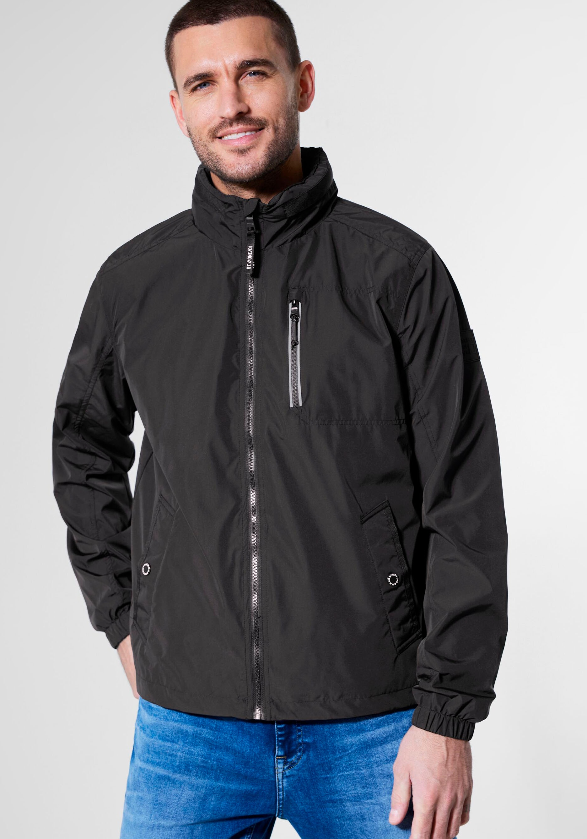 STREET ONE MEN Windbreaker, mit reflektierenden Akzenten auf der Zipper-Brusttasche