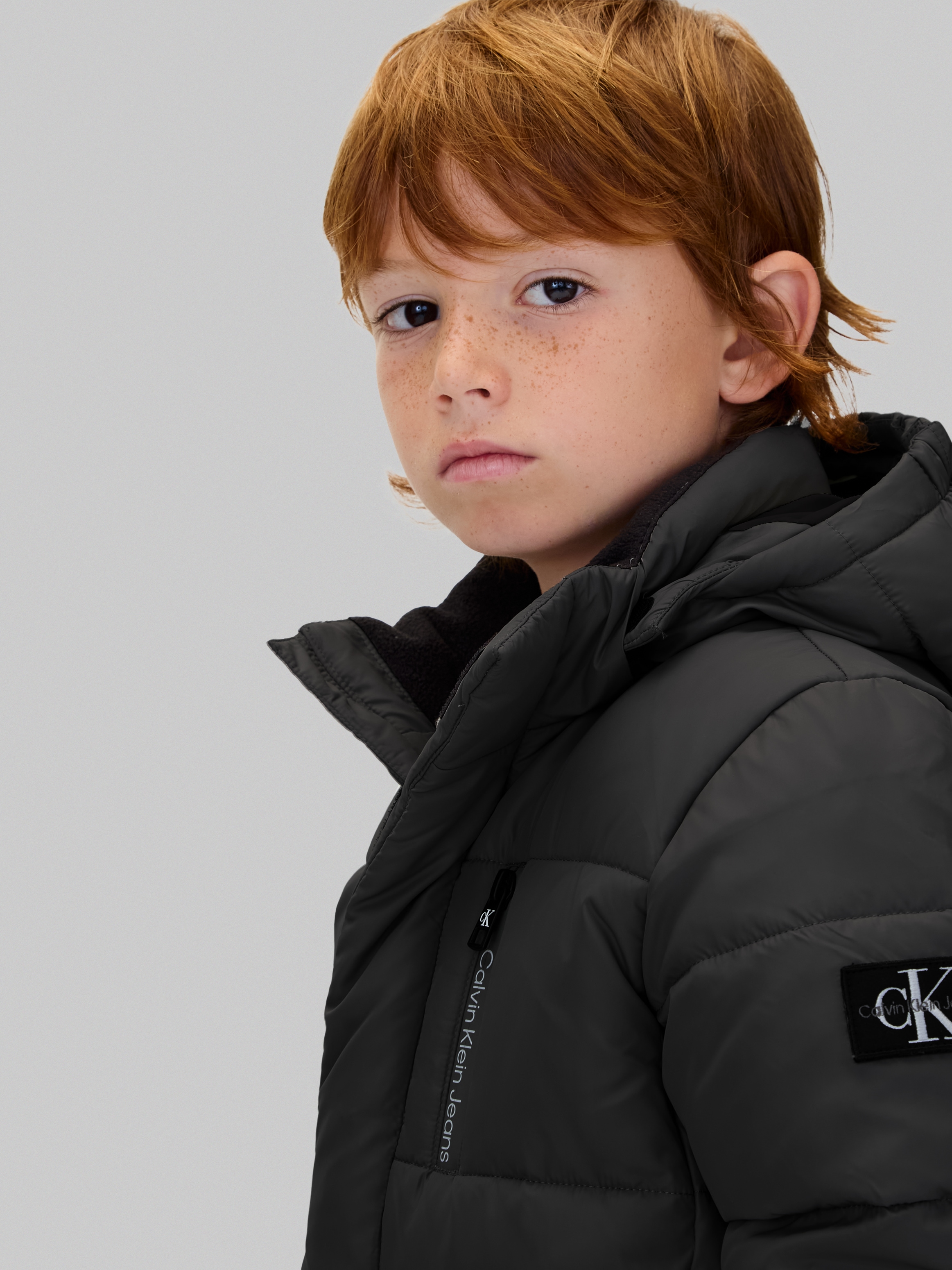 Calvin Klein Jeans Winterjacke »ESSENTIAL PUFFER JACKET«, mit Kapuze, für Kinder bis 16 Jahre und Calvin Klein Markenlabel