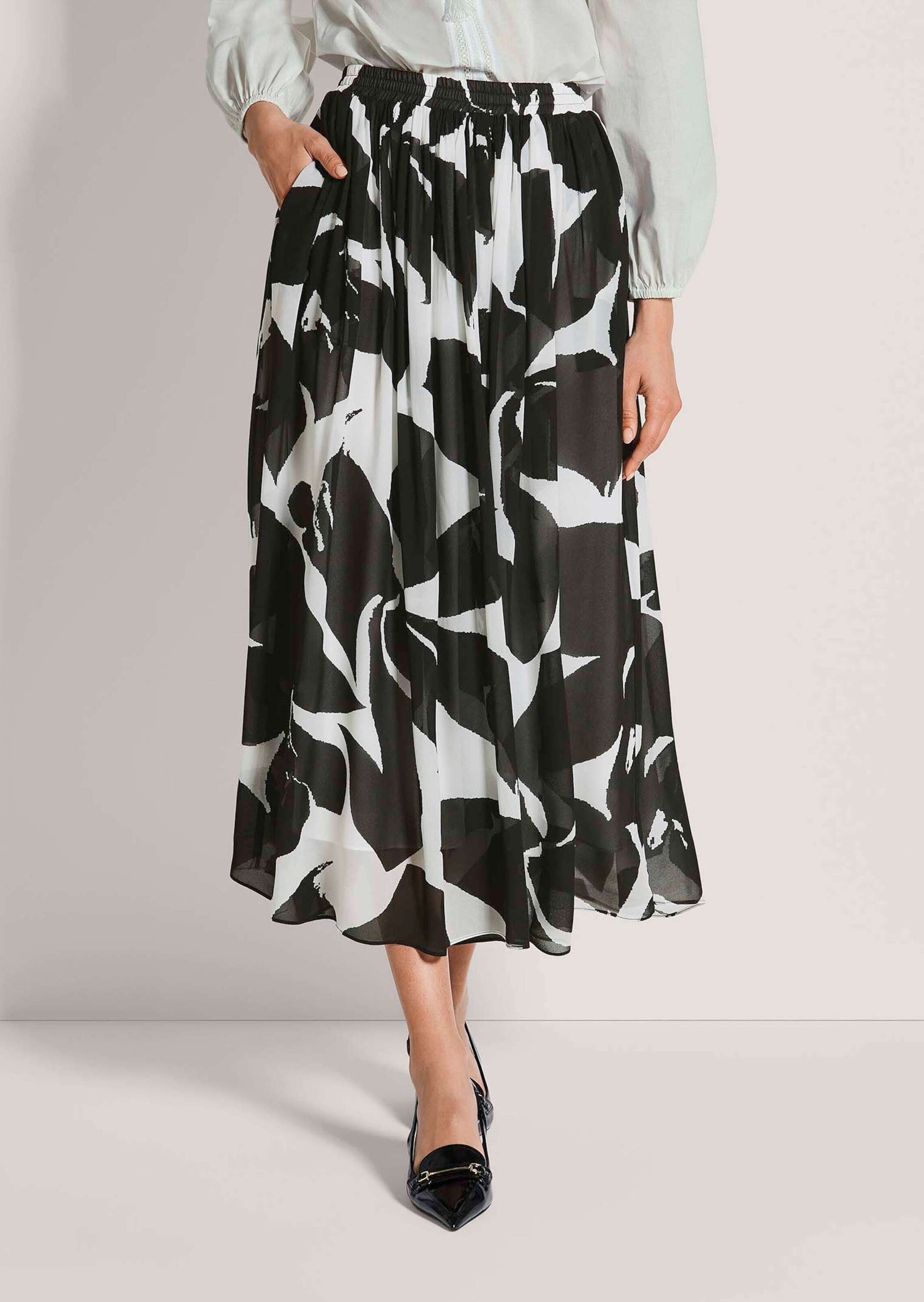 MADELEINE Midirock »Midirock Druckrock mit floralem Muster« Nahttaschen