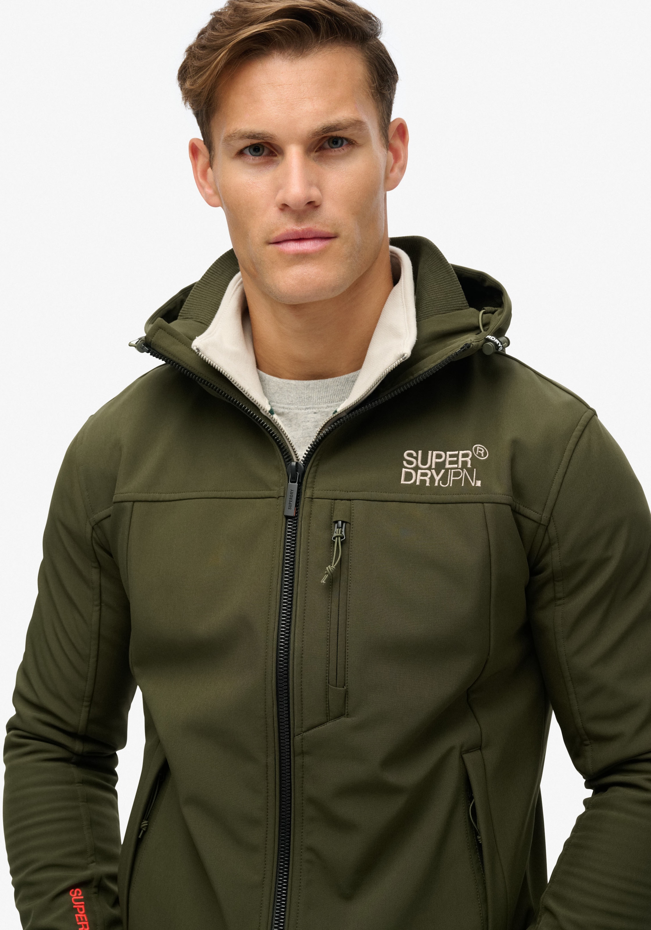 Superdry Outdoorjacke »HOODED SOFT SHELL TREKKER JKT«, mit Kapuze