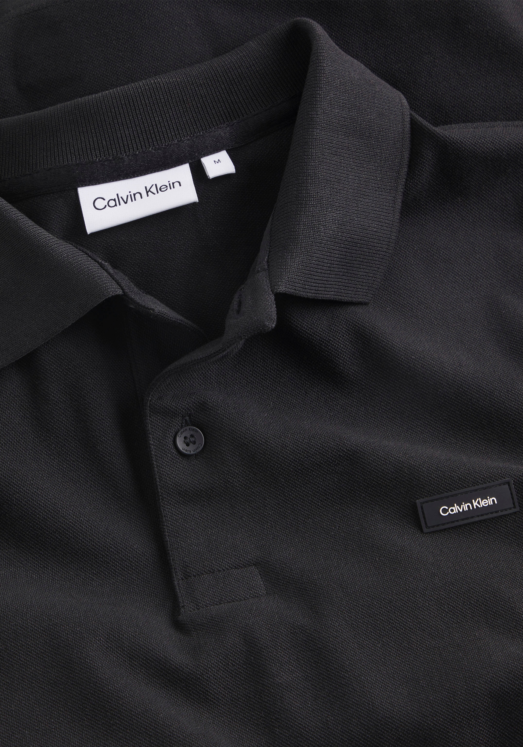 Calvin Klein Poloshirt, mit Calvin Klein Logo auf der Brust