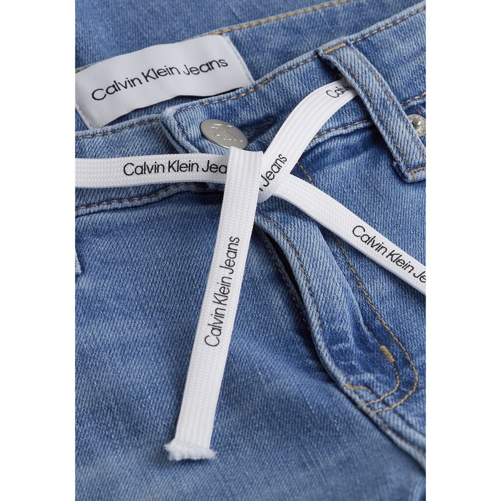 Calvin Klein Jeans Skinny-fit-Jeans »MID RISE SKINNY«, mit Bindeband mit Calvin Klein Jeans Logo-Badge