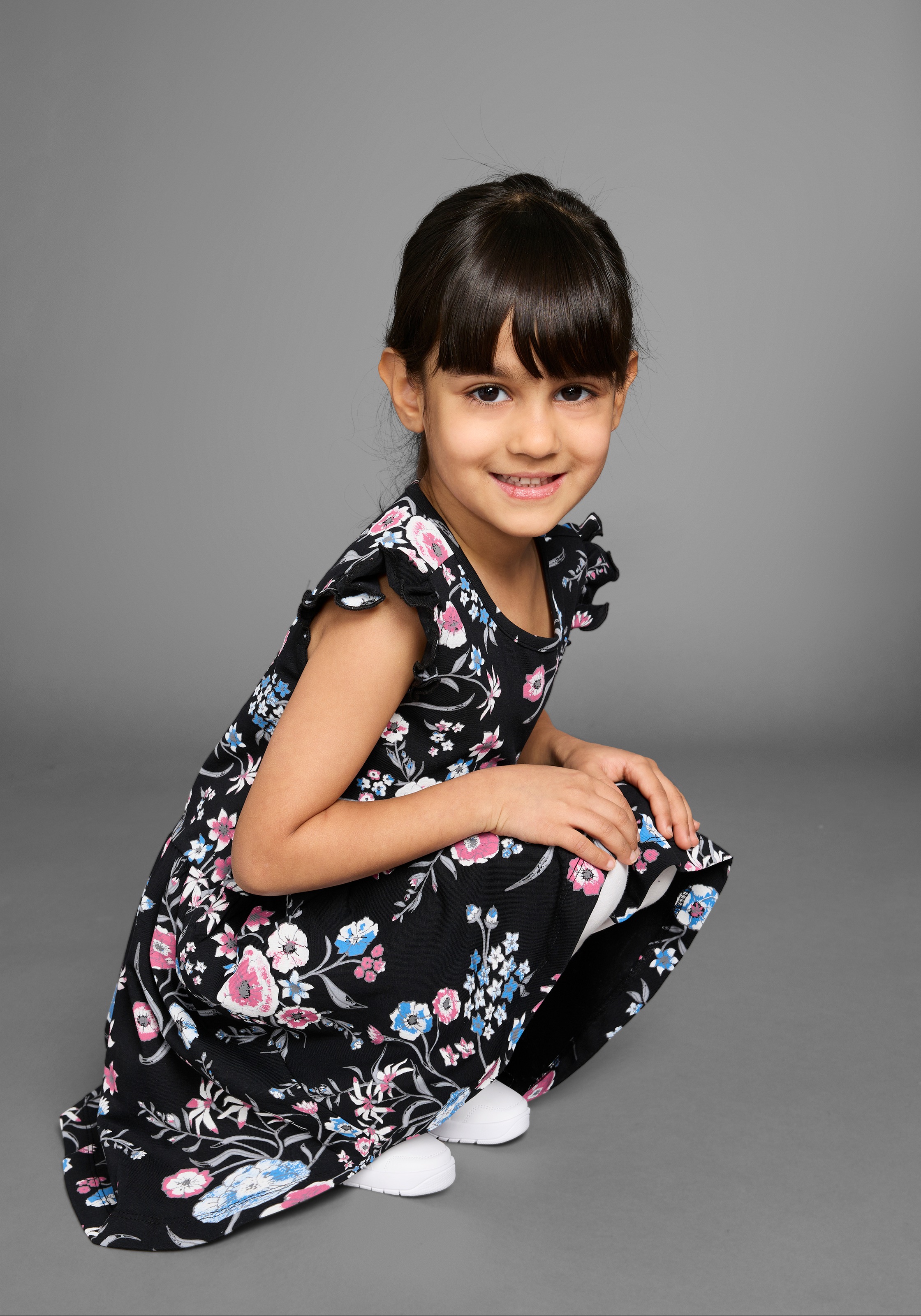 KIDSWORLD Jerseykleid »Shirtkleid im trendigen Allover-Muster« mit Flügelärmeln