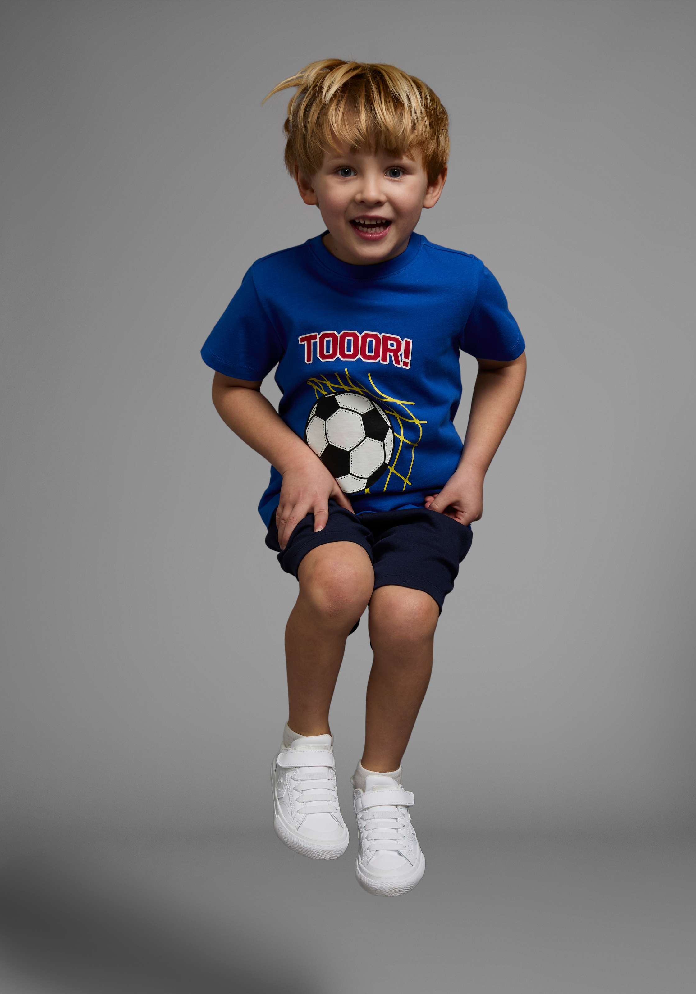 KIDSWORLD T-Shirt »Fußball-Print: TOOOR«, Kurzarm, Basic-Passform, mit Statements/Sprüchen