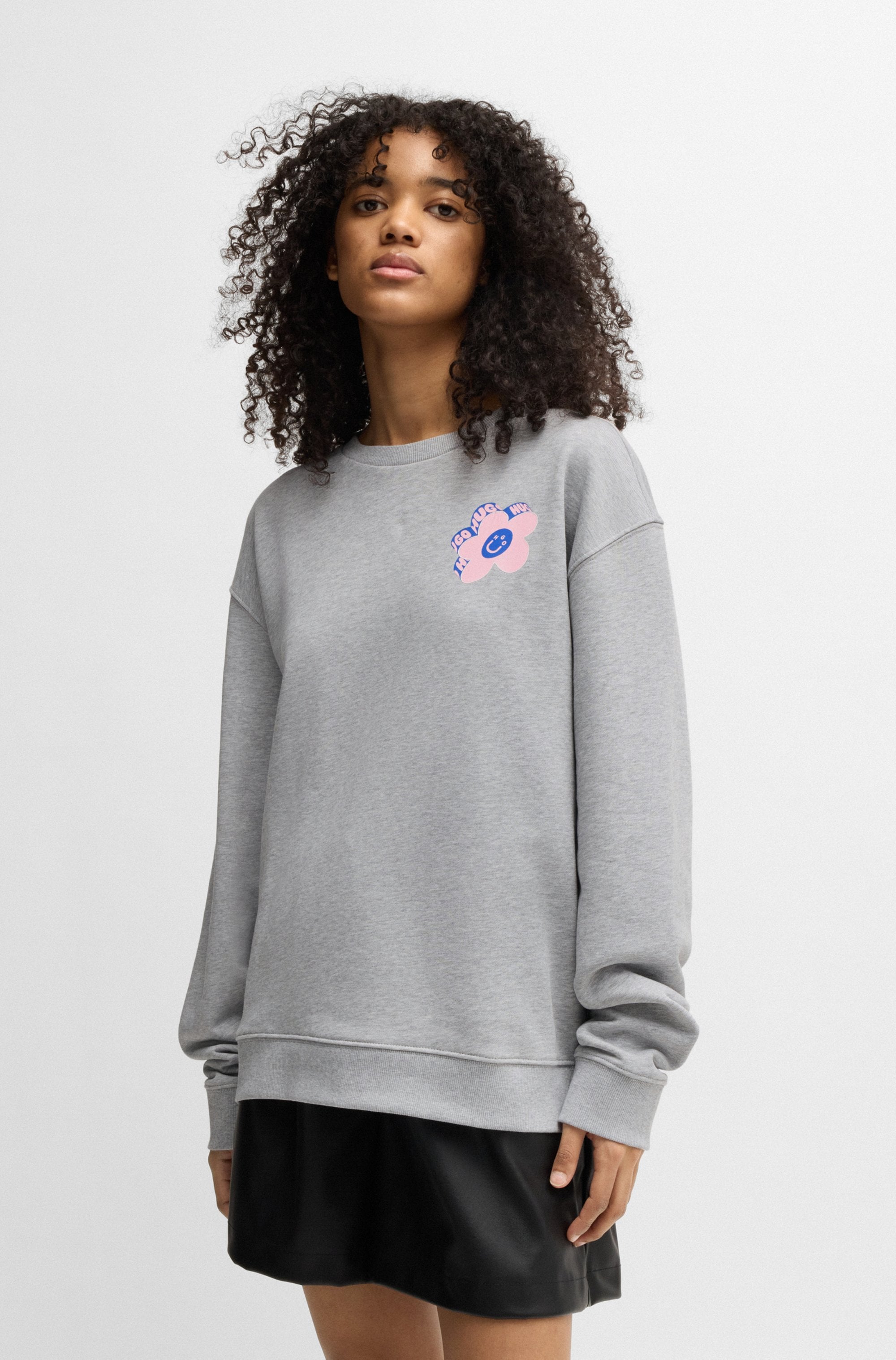 HUGO Blue Sweatshirt »Oversized Crew«, mit Flower Backprint, Straß Logo Print
