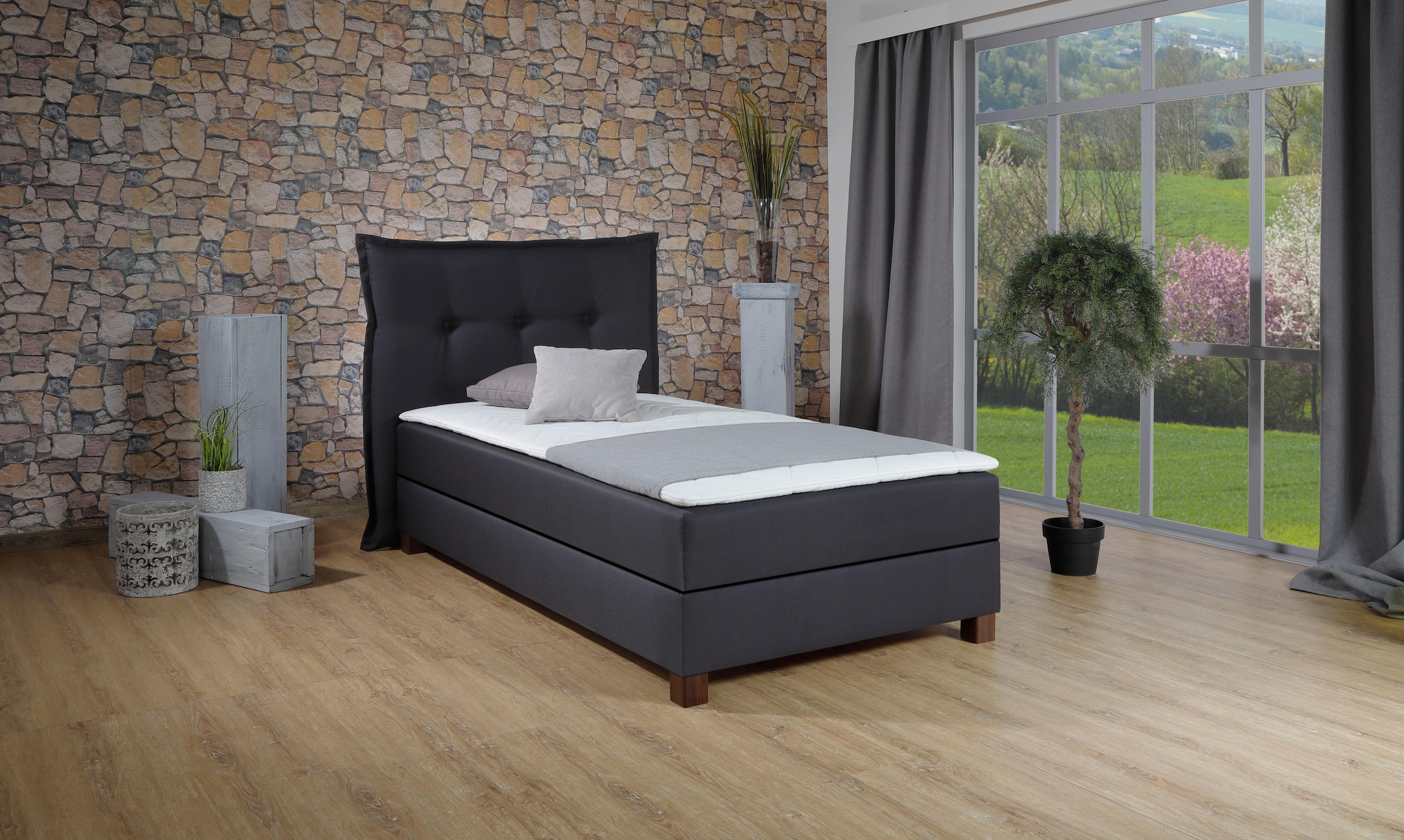 Boxspringbett mit Bettkasten in Schwarz