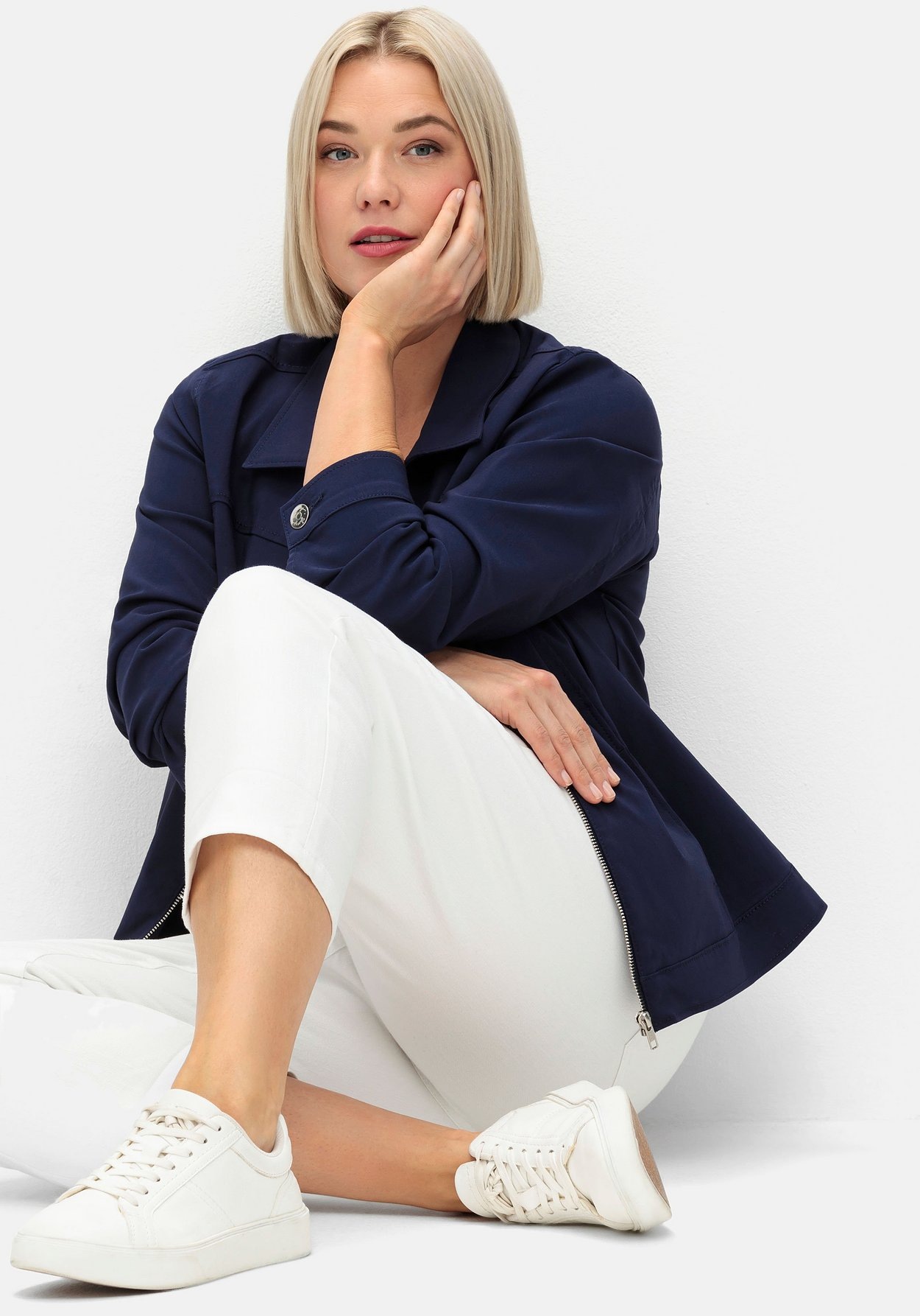 Sheego Stretch-Jeans »Schmale 7/8-Jeans mit Kontrasttape innen am Saum«