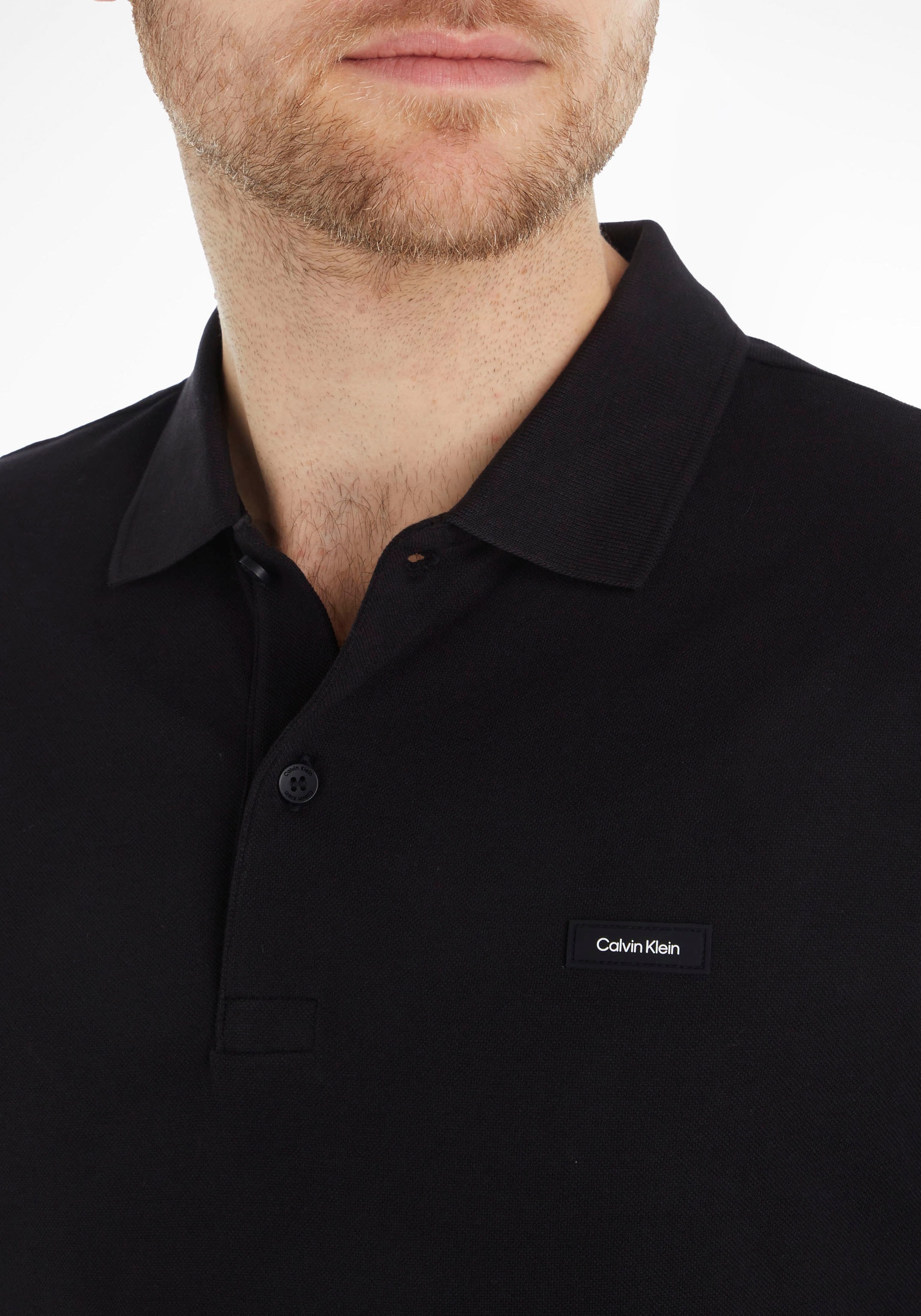 Calvin Klein Poloshirt, mit Calvin Klein Logo auf der Brust