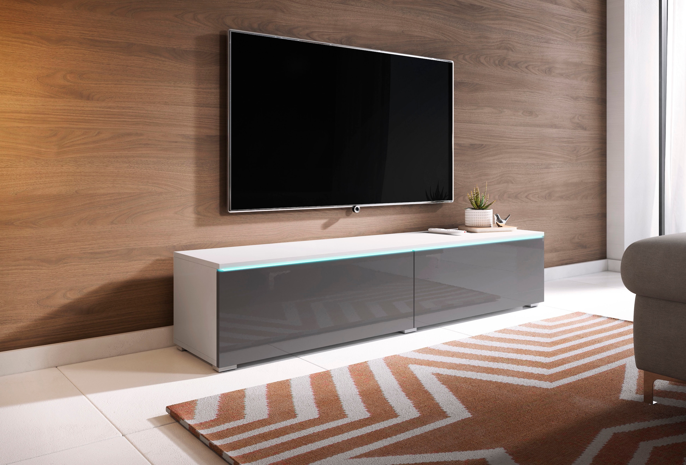 INOSIGN Lowboard »LOWBOARD D, wahlweise mit oder ohne Beleuchtung«, modernes TV-Board ohne Griffe, mit viel Stauraum,stehend und hängend